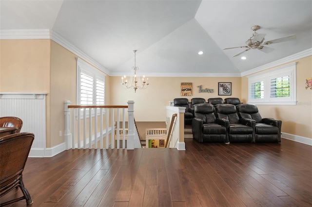 cinema featuring dark hardwood / wood-style floors and a wealth of natural light