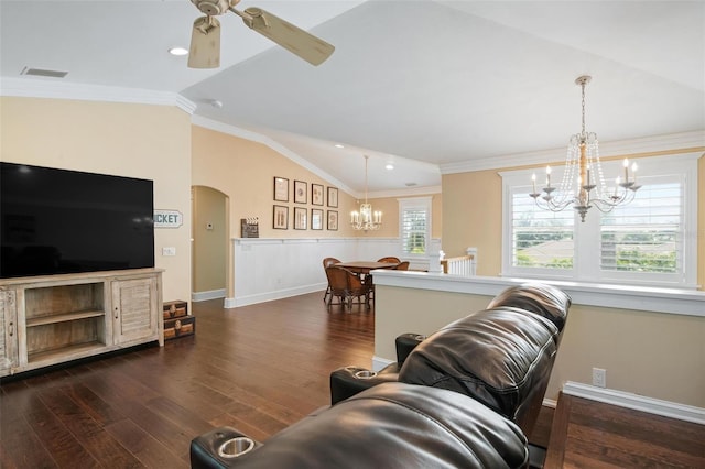 living room with ceiling fan with notable chandelier, lofted ceiling, dark wood-type flooring, and ornamental molding