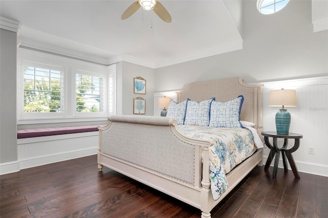 bedroom with ceiling fan, crown molding, and dark hardwood / wood-style floors