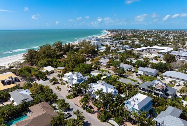 drone / aerial view with a view of the beach and a water view