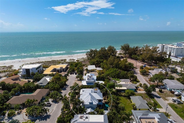 bird's eye view featuring a beach view and a water view