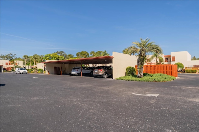 view of parking with a carport