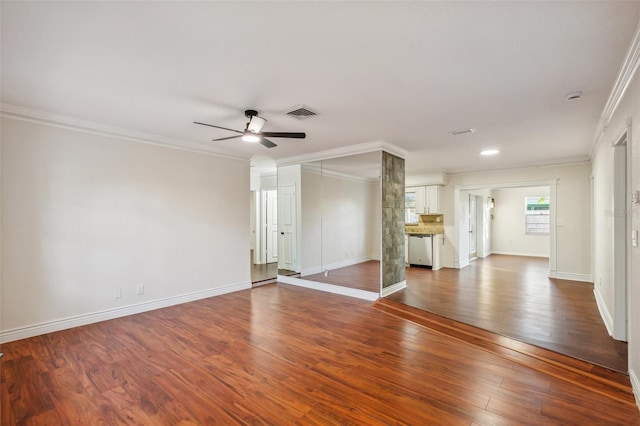 unfurnished living room with dark hardwood / wood-style floors, ceiling fan, and ornamental molding