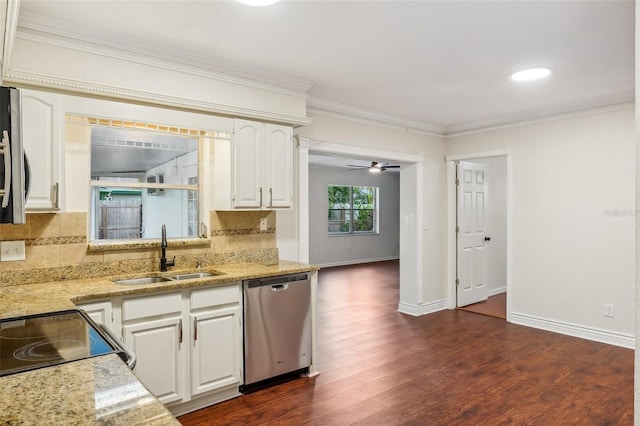 kitchen featuring white cabinets, dark hardwood / wood-style floors, sink, and appliances with stainless steel finishes