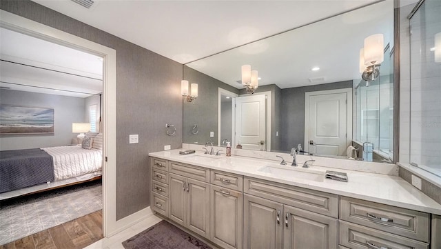 bathroom featuring wood-type flooring and vanity