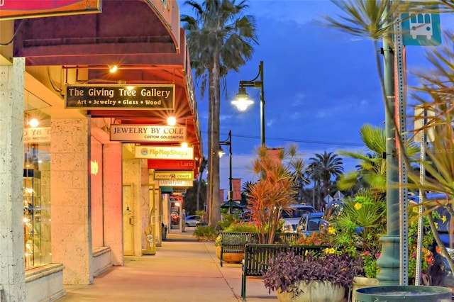 view of outdoor building at dusk