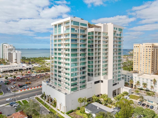 view of building exterior with a water view