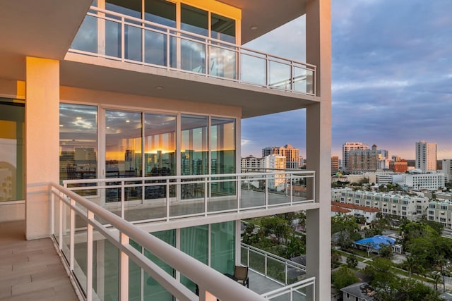 view of balcony at dusk