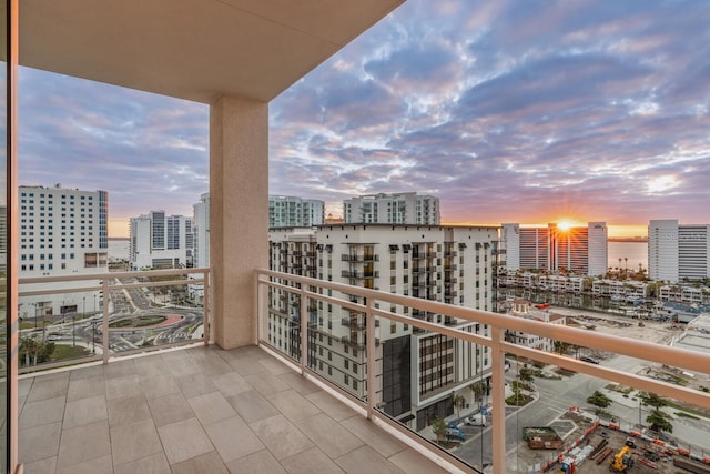 view of balcony at dusk