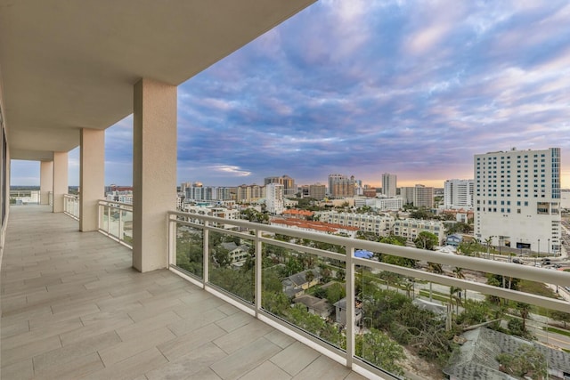 view of balcony at dusk