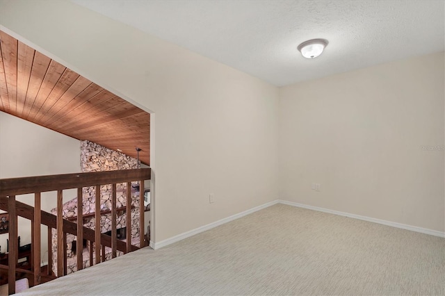 interior space with wooden ceiling and vaulted ceiling