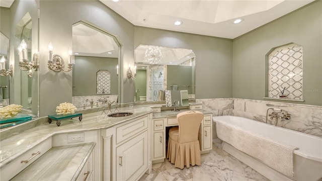 bathroom with a bathtub and vanity