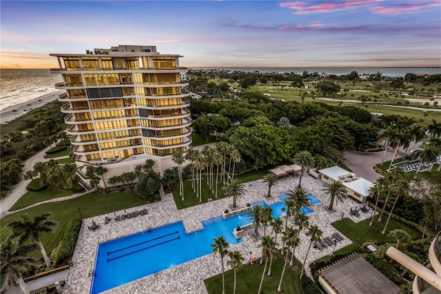 aerial view at dusk with a water view