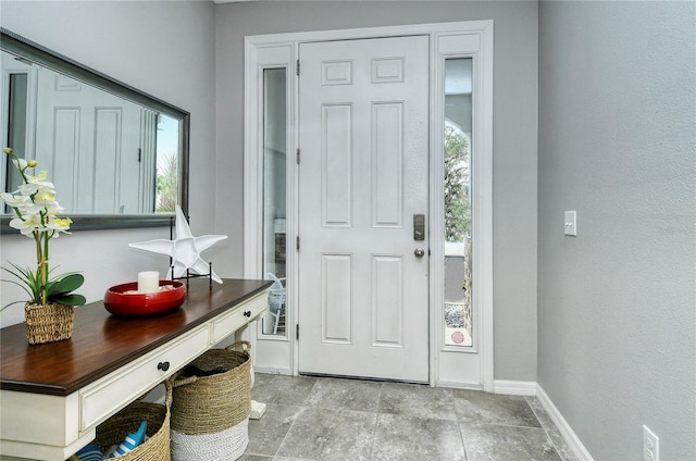 entrance foyer featuring a healthy amount of sunlight