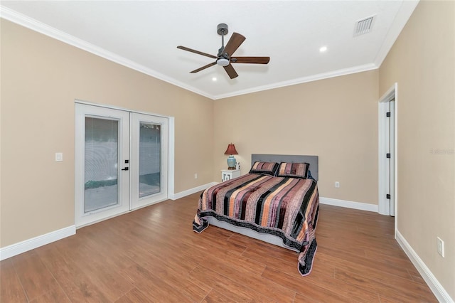 bedroom with ceiling fan, light hardwood / wood-style flooring, french doors, and ornamental molding