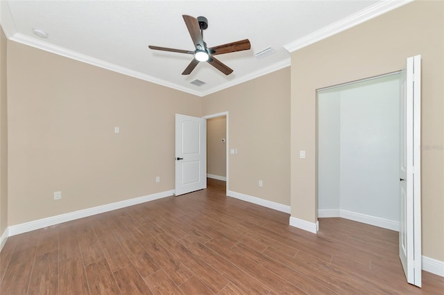 unfurnished bedroom with a closet, ceiling fan, hardwood / wood-style floors, and ornamental molding