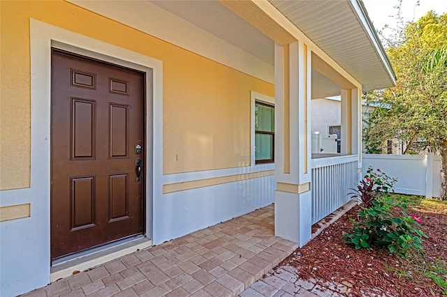 entrance to property with covered porch