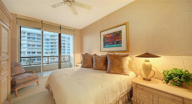 carpeted bedroom with ceiling fan and access to outside