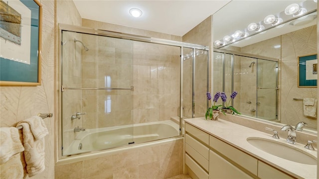 bathroom with combined bath / shower with glass door and vanity