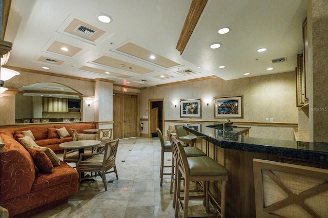 bar featuring coffered ceiling