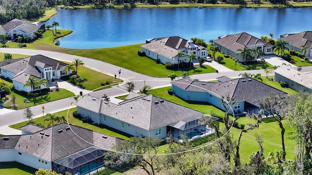 bird's eye view with a water view