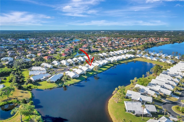 birds eye view of property featuring a water view