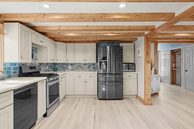 kitchen featuring white cabinetry, beamed ceiling, decorative backsplash, appliances with stainless steel finishes, and light wood-type flooring