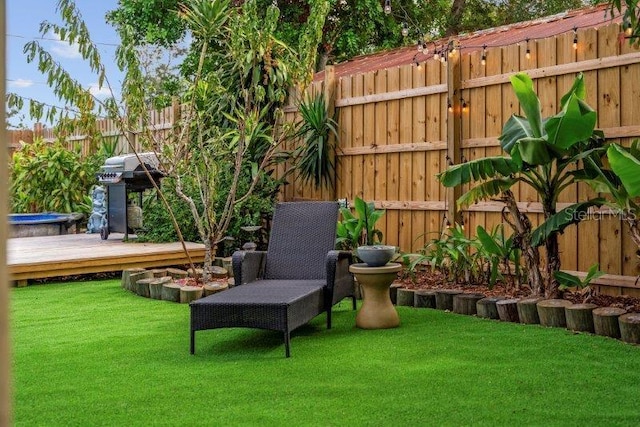 view of yard featuring a deck