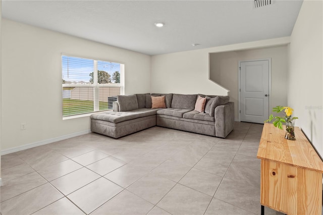 living room featuring light tile patterned flooring