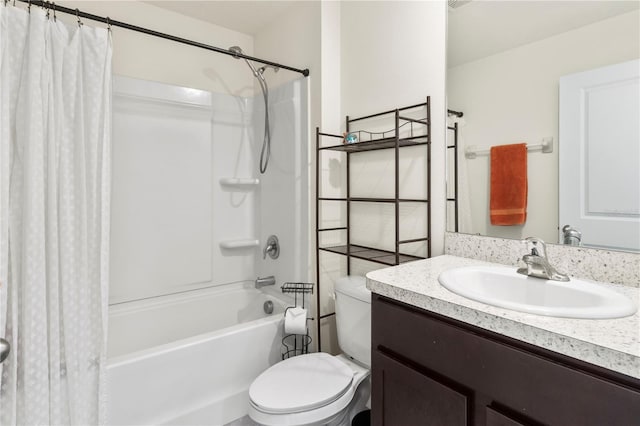 full bathroom featuring vanity, toilet, and shower / bath combo with shower curtain