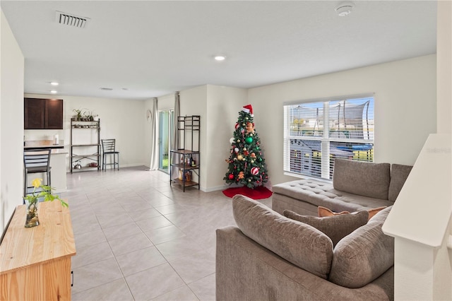 living room featuring light tile patterned floors