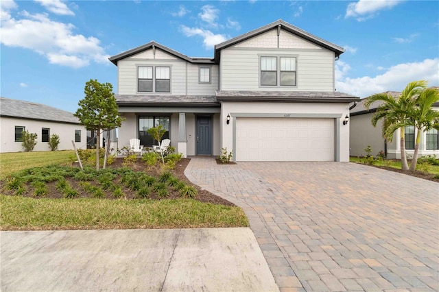 view of front of property featuring a garage