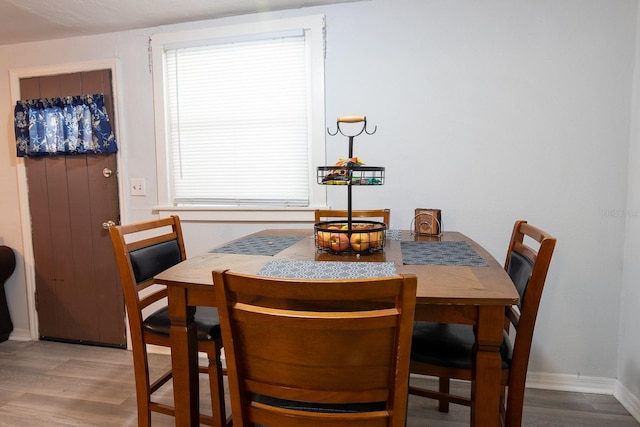 2029 Palm Ter, Sarasota, FL 34231 - dining room featuring wood finished floors