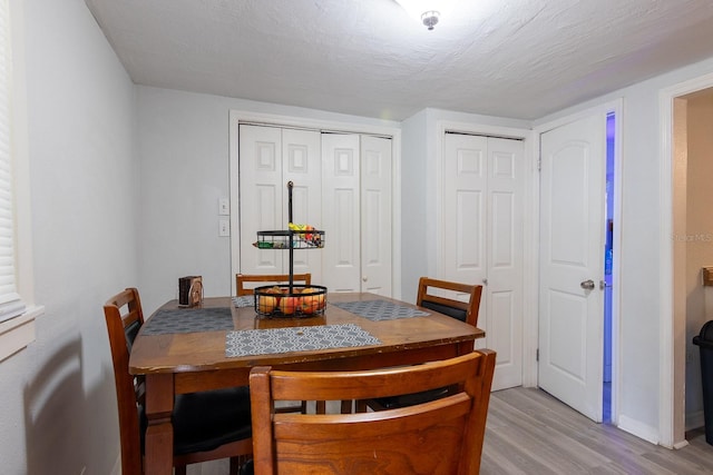 2029 Palm Ter, Sarasota, FL 34231 - dining space with light wood finished floors and baseboards