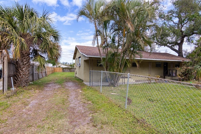 exterior space with a front yard