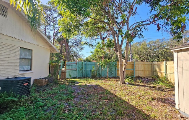 view of yard featuring central AC unit