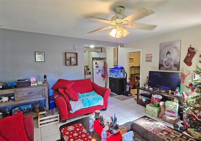 tiled living room with ceiling fan