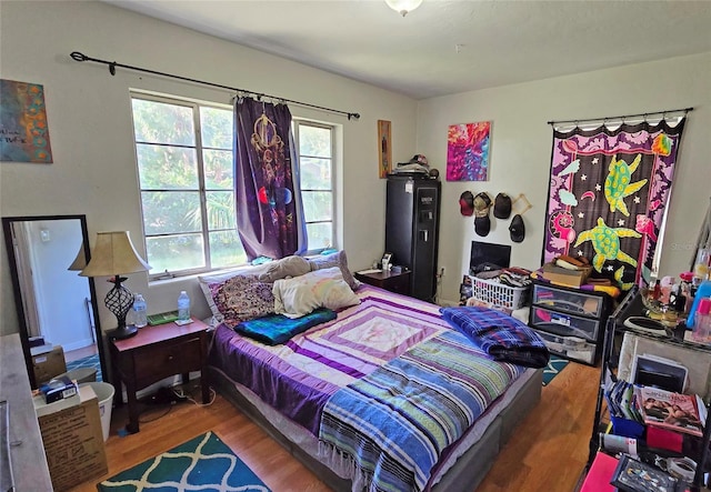 bedroom featuring hardwood / wood-style flooring