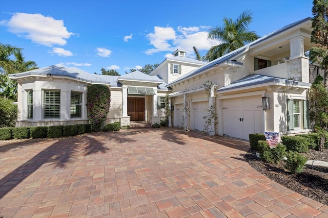 view of front of property with a garage