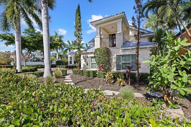 exterior space with a balcony