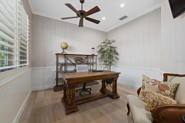 office featuring crown molding, ceiling fan, and light hardwood / wood-style floors