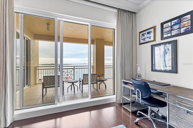 office featuring hardwood / wood-style floors and ornamental molding