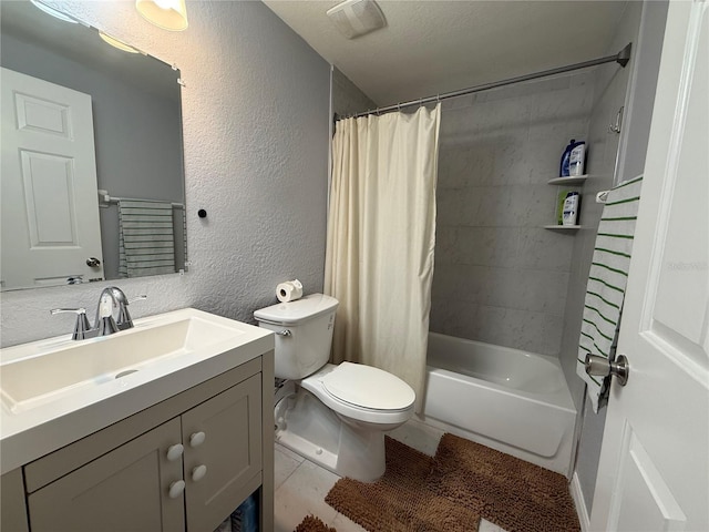 full bathroom with shower / bath combo, vanity, tile patterned flooring, toilet, and a textured ceiling