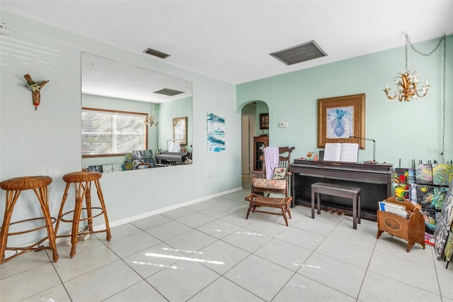 sitting room with tile patterned flooring