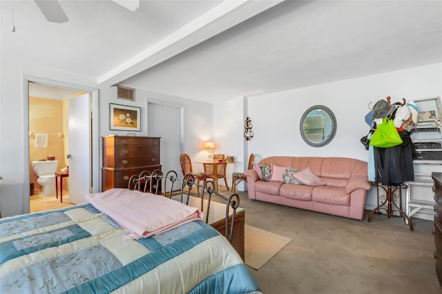 bedroom with ceiling fan, ensuite bath, and beamed ceiling