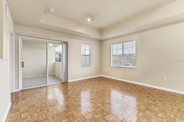 unfurnished bedroom featuring light parquet flooring