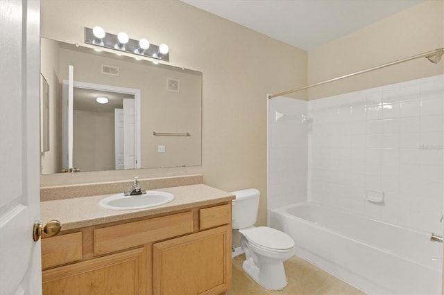 full bathroom with tile patterned floors, shower / bathing tub combination, vanity, and toilet