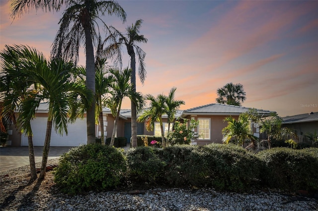 view of front of property featuring a garage