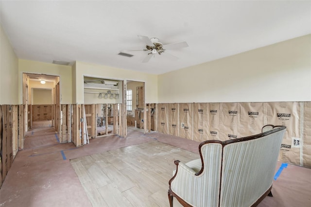 unfurnished room featuring ceiling fan