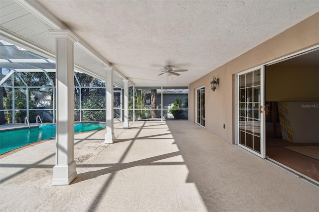 exterior space featuring ceiling fan